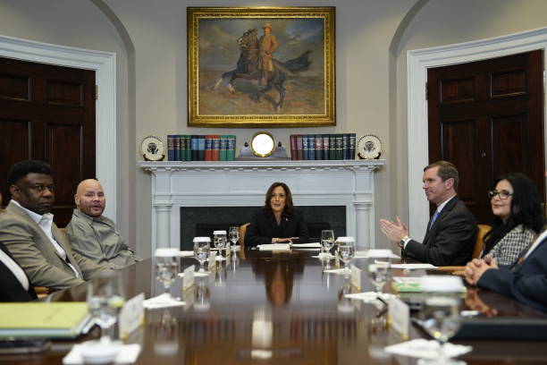 Flanked by US musician Fat Joe (L) and Kentucky Governor Andy Beshear (R), US Vice President Kamala Harris (C) speaks during a roundtable conversation about marijuana reform and criminal justice reform, in the Roosevelt Room of the White House on March 15, 2024 in Washington, DC. (Photo by Kent Nishimura / AFP) (Photo by KENT NISHIMURA/AFP via Getty Images)