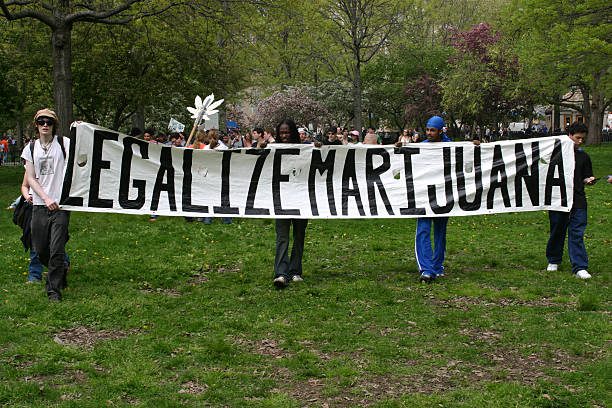 Demonstrators partake in a march to Battery Park in support of legalization of marijuana. Supporters were seeking legalization of the drug, especially for medicinal use. (Photo by ANDREW HOLBROOKE/Corbis via Getty Images)